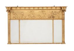 A GEORGE IV GILTWOOD AND COMPOSITION WALL MIRROR