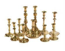 A COLLECTION OF FIVE VARIOUS PAIRS OF BRASS CANDLESTICKS