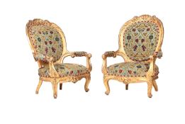 A PAIR OF GILTWOOD AND UPHOLSTERED ARMCHAIRS IN 19TH CENTURY TASTE