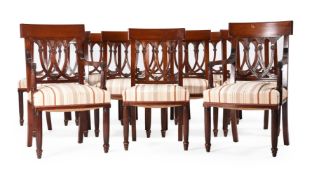 A SET OF TWELVE MAHOGANY DINING CHAIRS IN GEORGE III STYLE