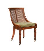 A WILLIAM IV BIRD'S EYE MAPLE AND CANED BERGERE