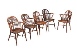 A HARLEQUIN SET OF FIVE YEW AND ELM WINDSOR ARMCHAIRS