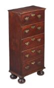 A MAHOGANY CHEST OF DRAWERS