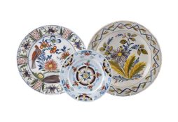 A GROUP OF THREE VARIOUS DELFT POLYCHROME PLATES