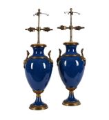 A PAIR OF BLUE GLAZED AND GILT METAL MOUNTED TABLE LAMPS