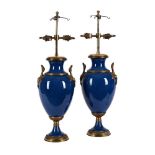 A PAIR OF BLUE GLAZED AND GILT METAL MOUNTED TABLE LAMPS