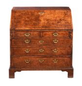 A GEORGE III BURR ELM AND BURR WALNUT BUREAU
