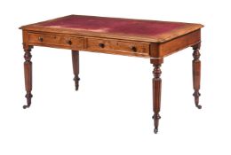 A VICTORIAN MAHOGANY AND TOOLED LEATHER WRITING TABLE