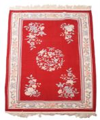 A CHINESE WASHED WOOL RUG