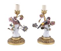A PAIR OF CONTINENTAL PORCELAIN AND GILT METAL MOUNTED TABLE LAMPS