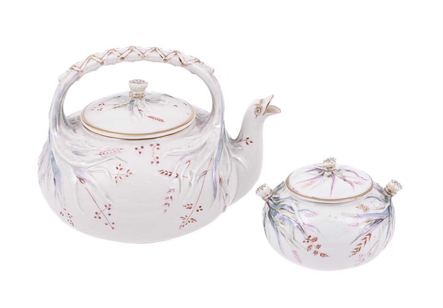 A BELLEEK (FIRST PERIOD) 'GRASS' PATTERN TEAPOT AND COVER AND A SUGAR BOX AND COVER ENSUITE