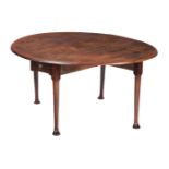 A MAHOGANY OVAL TWIN DROP LEAF DINING TABLE