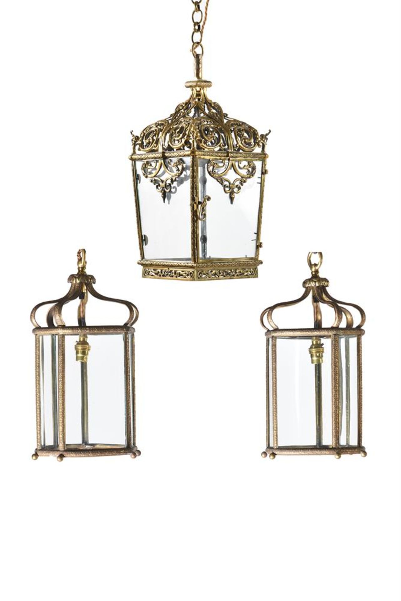 A BRASS LANTERN OF TAPERED FORM