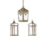 A BRASS LANTERN OF TAPERED FORM