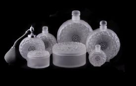LALIQUE, CRYSTAL LALIQUE, DAHLIA, A SUITE OF OPAQUE GLASS DRESSING TABLE ITEMS