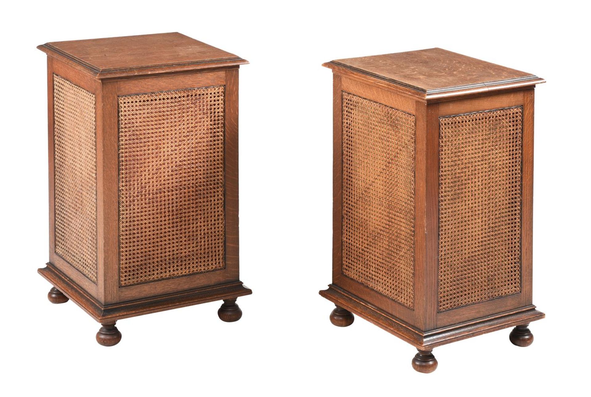 A PAIR OF OAK AND SPLIT-CANE PANELLED LAUNDRY BASKETS
