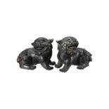 A PAIR OF CHINESE BRONZE BUDDHIST LIONS