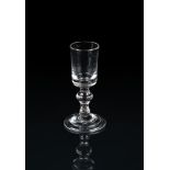 A SMALL BALUSTER GIN OR DRAM GLASS