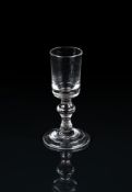 A SMALL BALUSTER GIN OR DRAM GLASS