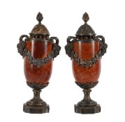 A PAIR OF GILT AND SILVERED METAL MOUNTED RED MARBLE LIDDED URNS