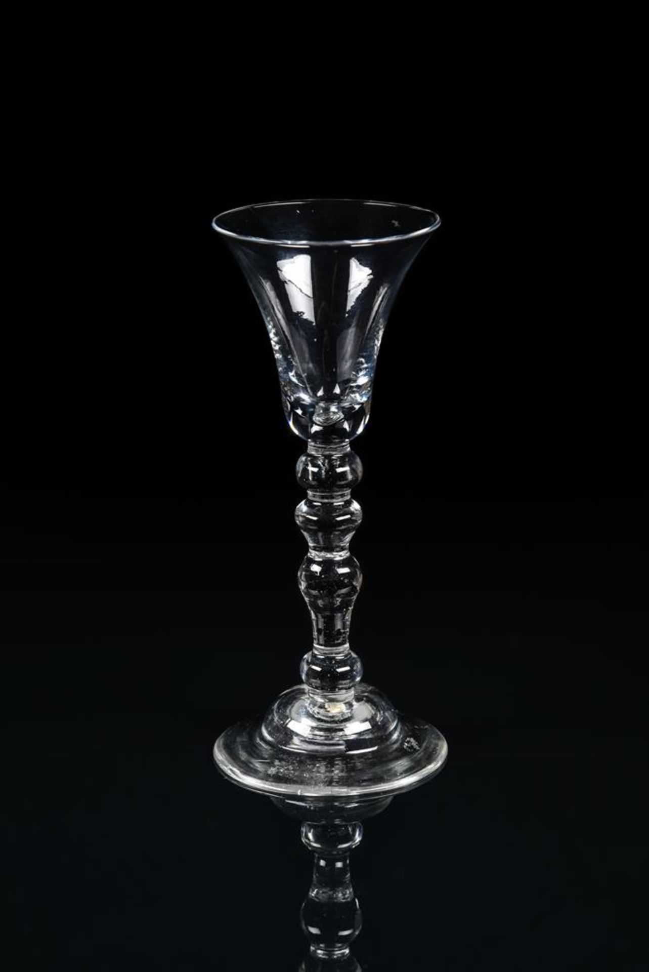 A LIGHT BALUSTER WINE GLASS