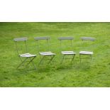 A SET OF FOUR PAINTED WOOD AND WROUGHT IRON FOLDING GARDEN CHAIRS