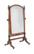 AN EARLY VICTORIAN MAHOGANY CHEVAL GLASS