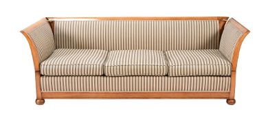 A NORTH EUROPEAN BIRCH AND UPHOLSTERED SOFA