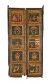 AN INDIAN POLYCHROME PAINTED WOOD PANELED DOOR