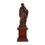 AN ITALIAN CARVED BOXWOOD FIGURE OF THE MADONNA AND CHILD