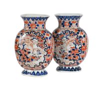 A PAIR OF JAPANESE IMARI OVAL SECTION VASES