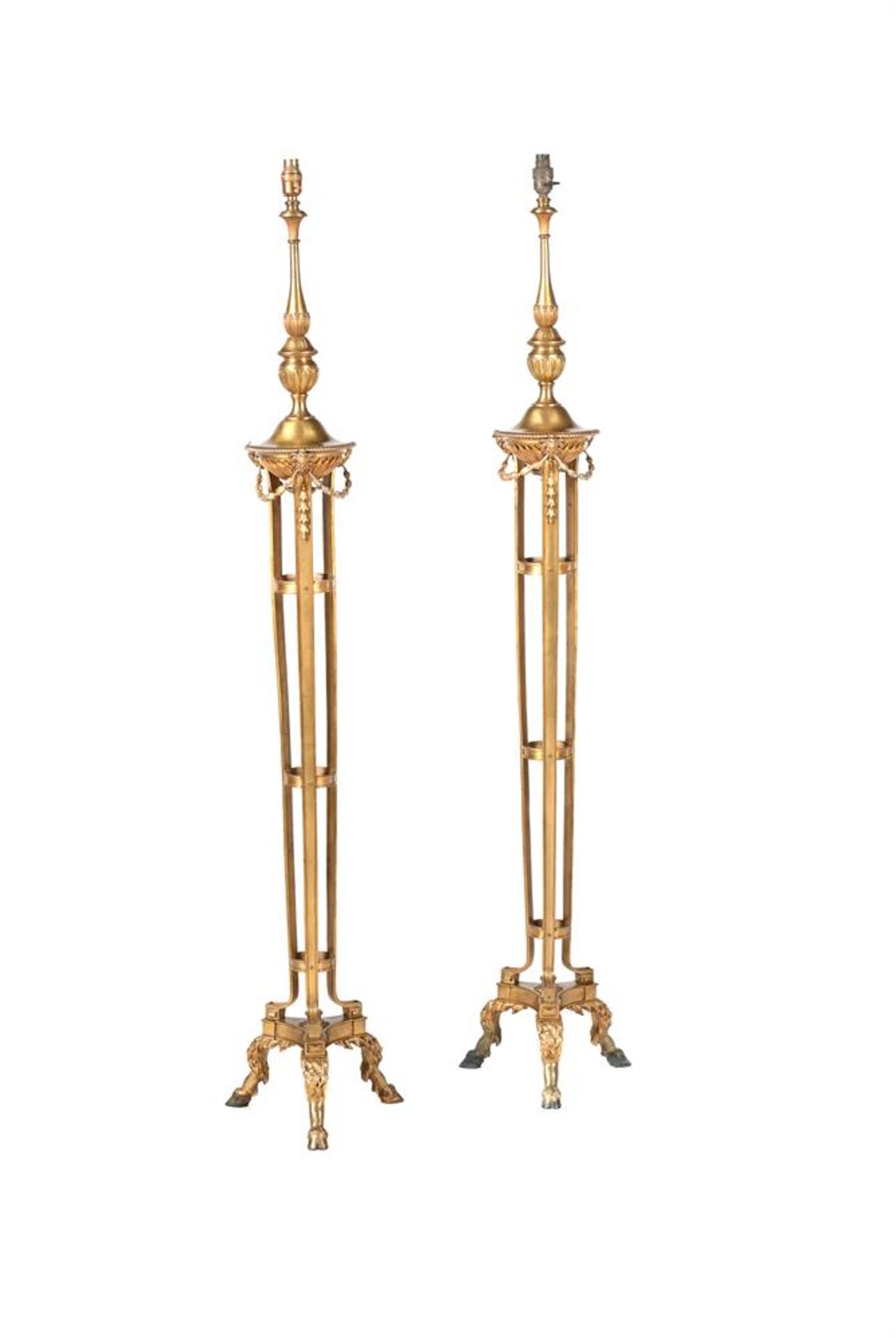 A PAIR OF GILT BRASS STANDARD LAMPS