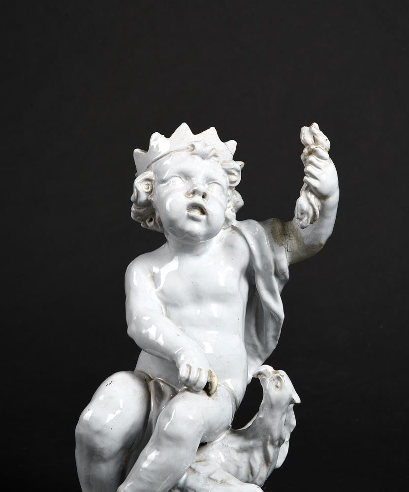 AN ITALIAN WHITE FAIENCE MODEL OF A CHILD AND EAGLE - Image 2 of 3