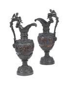 A PAIR OF BRONZED EWERS IN THE NEO-CLASSICAL TASTE