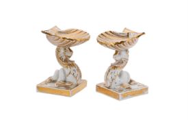 A PAIR OF WORCESTER PORCELAIN MYTHICAL BEAST TABLE SALTS