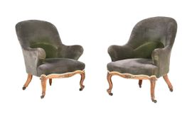 A PAIR OF VICTORIAN WALNUT ARMCHAIRS