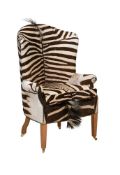 MARTS, AN OAK AND ZEBRA HIDE UPHOLSTERED WINGBACK CHAIR