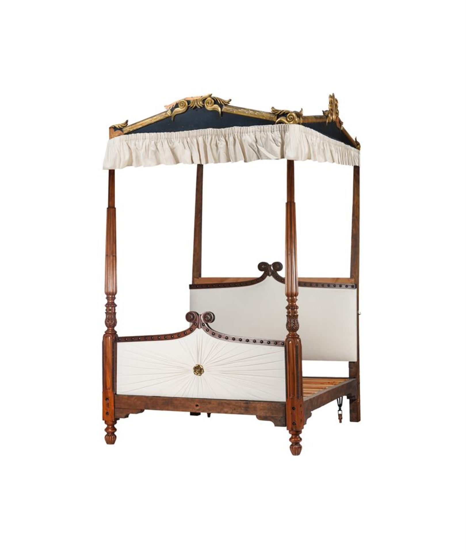 A FOUR POSTER BED IN VICTORIAN STYLE