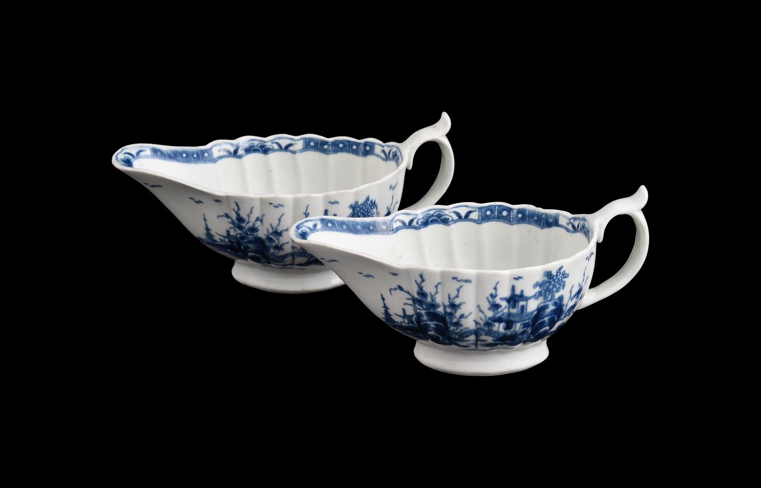 A PAIR OF WORCESTER BLUE AND WHITE SAUCEBOATS PAINTED WITH THE SO-CALLED 'MISSION CHURCH' PATTERN - Image 2 of 3