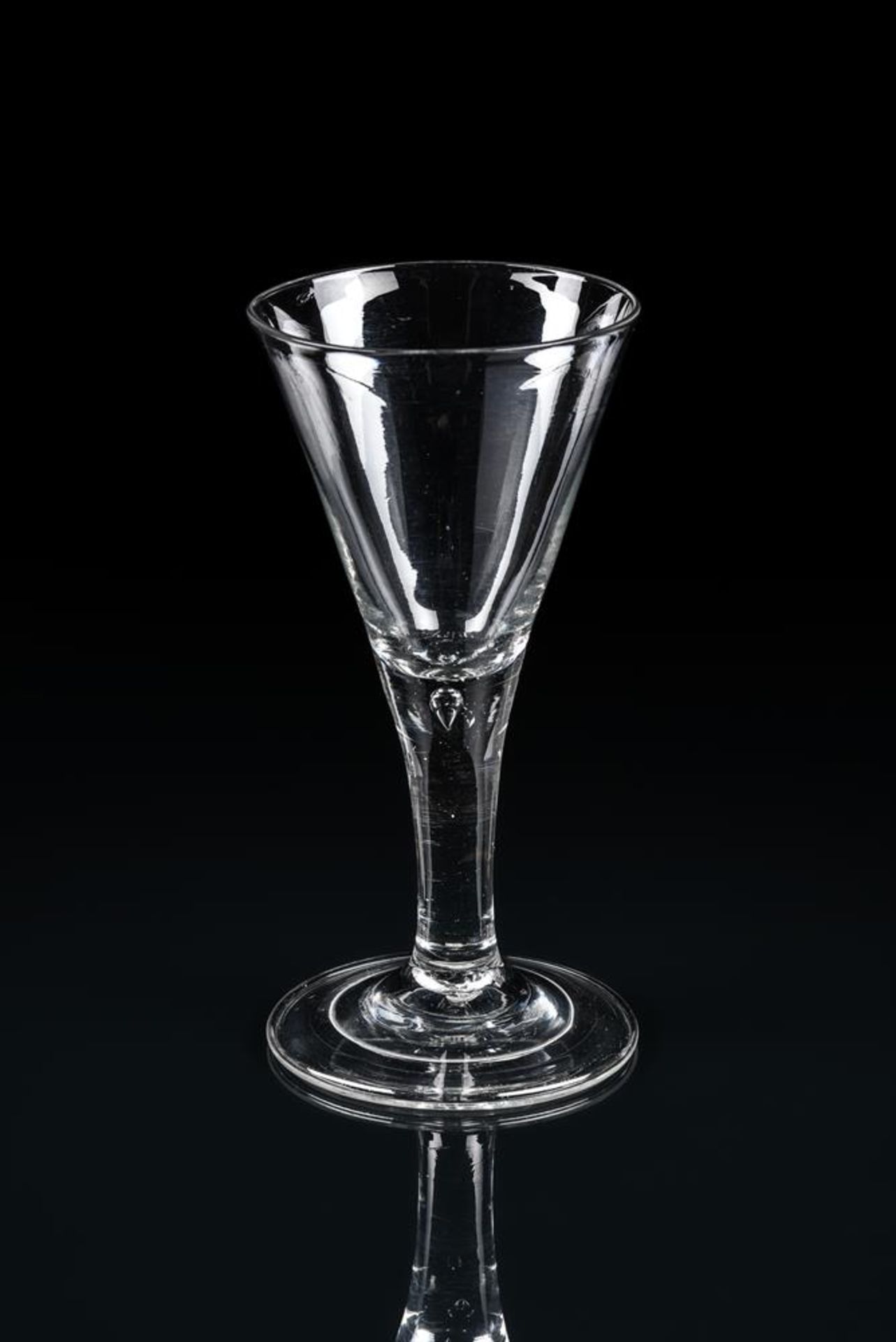 A LARGE PLAIN-STEMMED WINE GLASS OF DRAWN TRUMPET FORM