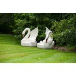 A COMPANION PAIR OF FIBREGLASS GARDEN SEATS IN THE FORM OF SWANS