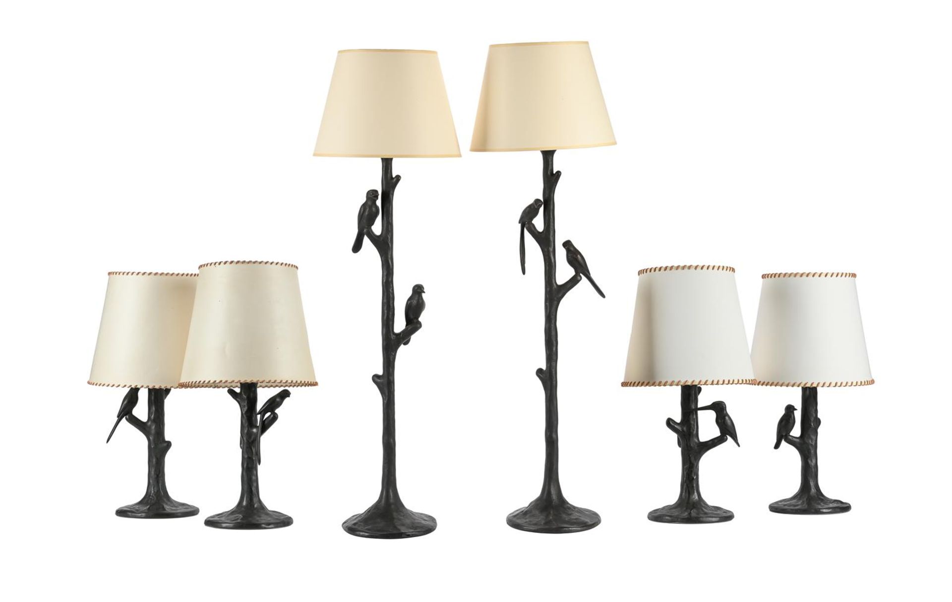 A SET OF SIX METAL LAMPS