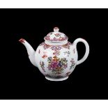 A LOWESTOFT PORCELAIN CHINESE EXPORT STYLE BULLET-SHAPED TEAPOT AND COVER IN THE THOMAS CURTIS STYLE