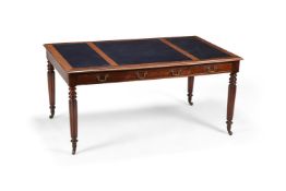 A MAHOGANY AND LEATHER INSET WRITING TABLE IN WILLIAM IV STYLE