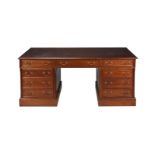 A MAHOGANY AND TOOLED LEATHER TWIN PEDESTAL PARTNER'S DESK