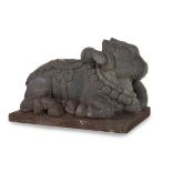 A CARVED GRANITE MODEL OF A NANDI BULL