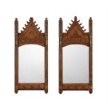 A PAIR OF OAK WALL MIRRORS IN GOTHIC TASTE