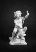 AN ITALIAN WHITE FAIENCE MODEL OF A CHILD AND EAGLE