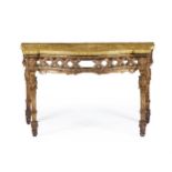 A CARVED GILTWOOD CONSOLE TABLE IN LOUIS XVI STYLE