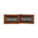 A PAIR OF WEDGWOOD BLACK JASPER FRAMED AND GLAZED PLAQUES